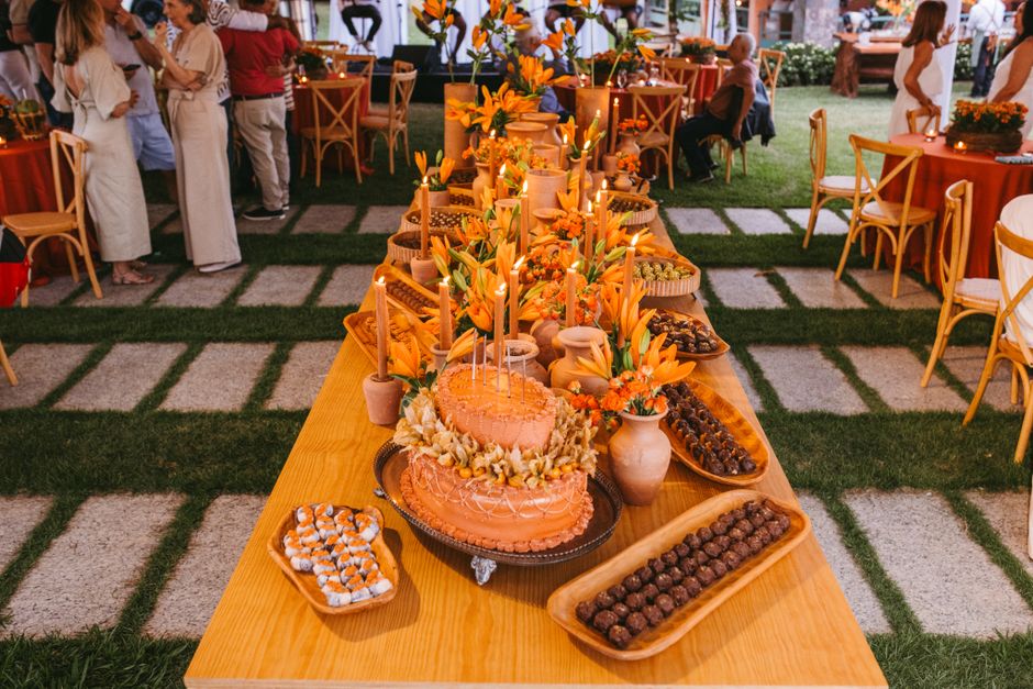 Guests enjoying a catered meal at a beautifully decorated wedding reception